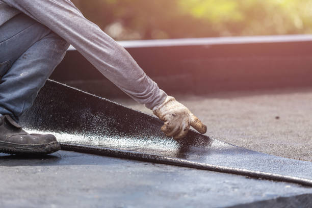 Professional Waterproofing technician working in New Richmond, WI